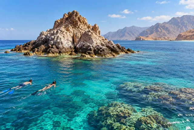 dibba rock beach — snorkeling paradise — AI illustration